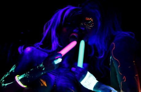 Pornstar Abigail Mac has lesbian sex underneath black lighting 79153981