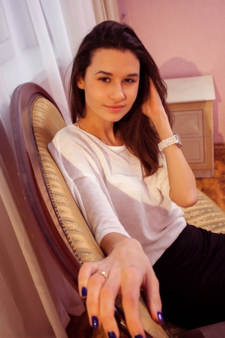 Skinny teen Anchen strips off her business attire to model totally naked 60449062