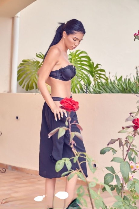 Hot girl Jess Brown gets naked on a balcony with her hair in a ponytail 24596595