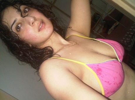 Indian solo girl takes self shots of her big natural tits 27692412
