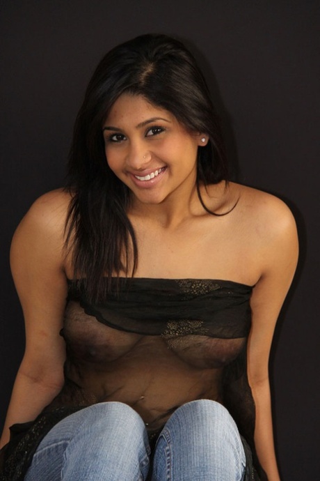 Indian babe shows her big natural tits in and out of see thru lingerie 31496142