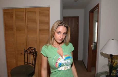 Caucasian amateur Nikki Sims shows her tattoos during non nude action 40603281