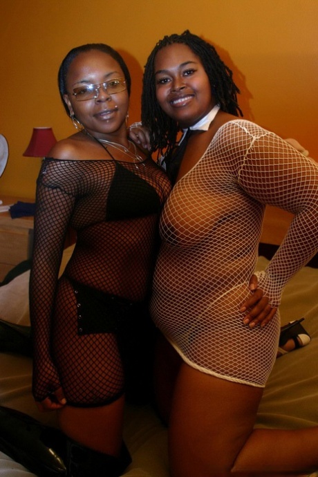 Ebony lesbians Miss Suckable & Shadow Cat lick each others pussy on a bed 10804674