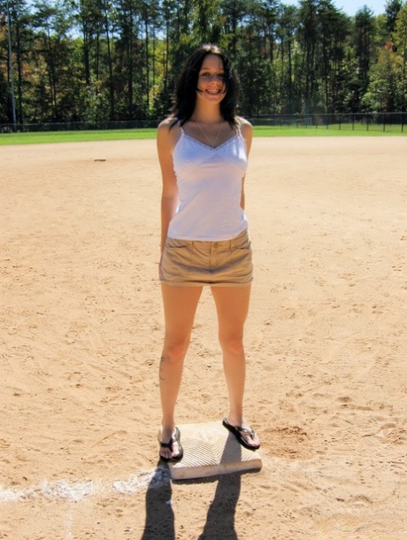 Dark haired teen exposes herself at a public ball diamond 34346829