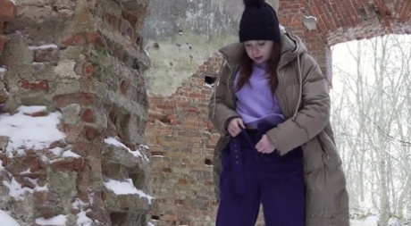 White girl Katya takes a badly needed pee upon pristine snow 68287144