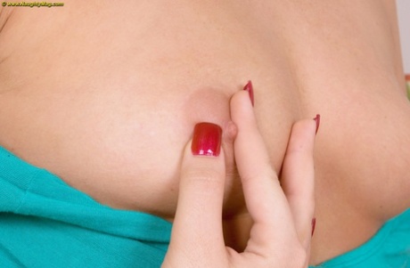 First timer Joscylin Brooks sports red nails while pinching a nipple 89207482