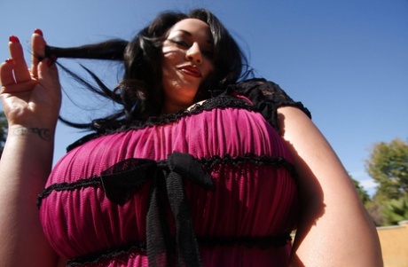 Beautiful MILF babe Julia Juggs shows her huge boobs outdoor 38490124