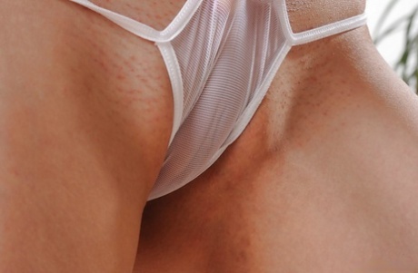 Sugary babe Nolita spreading her thighs and teasing her hungry pink pussy 73925317